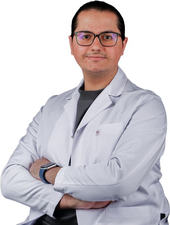 Dr. Ahmet Baydak, general dentist at Beautica Clinic in Istanbul, in a white clinical coat